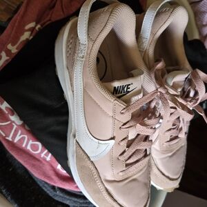 Nike Women’s Blush Pink Low-Top Sneakers with White Swoosh